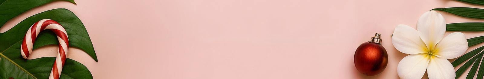 Rosa Hintergrund mit grünem Blatt, Blume und Weihnachtsdekoration.